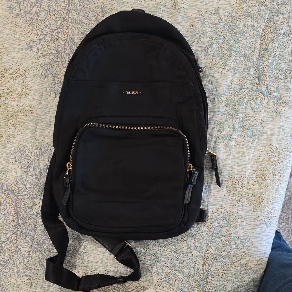 Tumi Black Backpack with Gold Accents